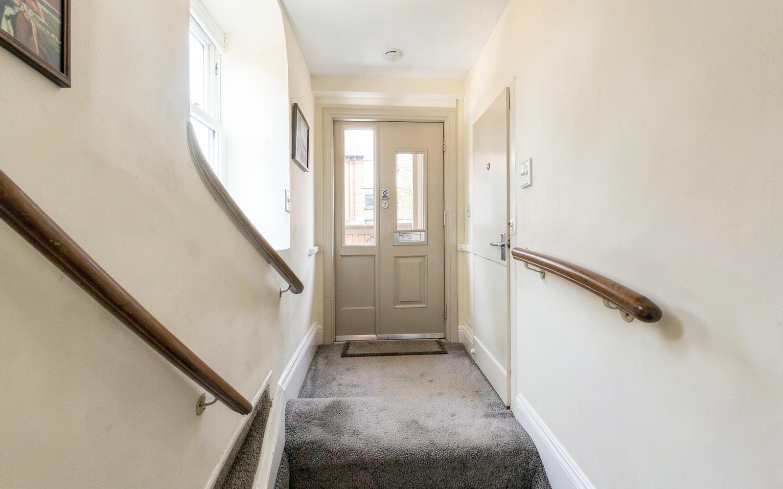 Freshly decorated communal hallway and stairwell in an apartment block
